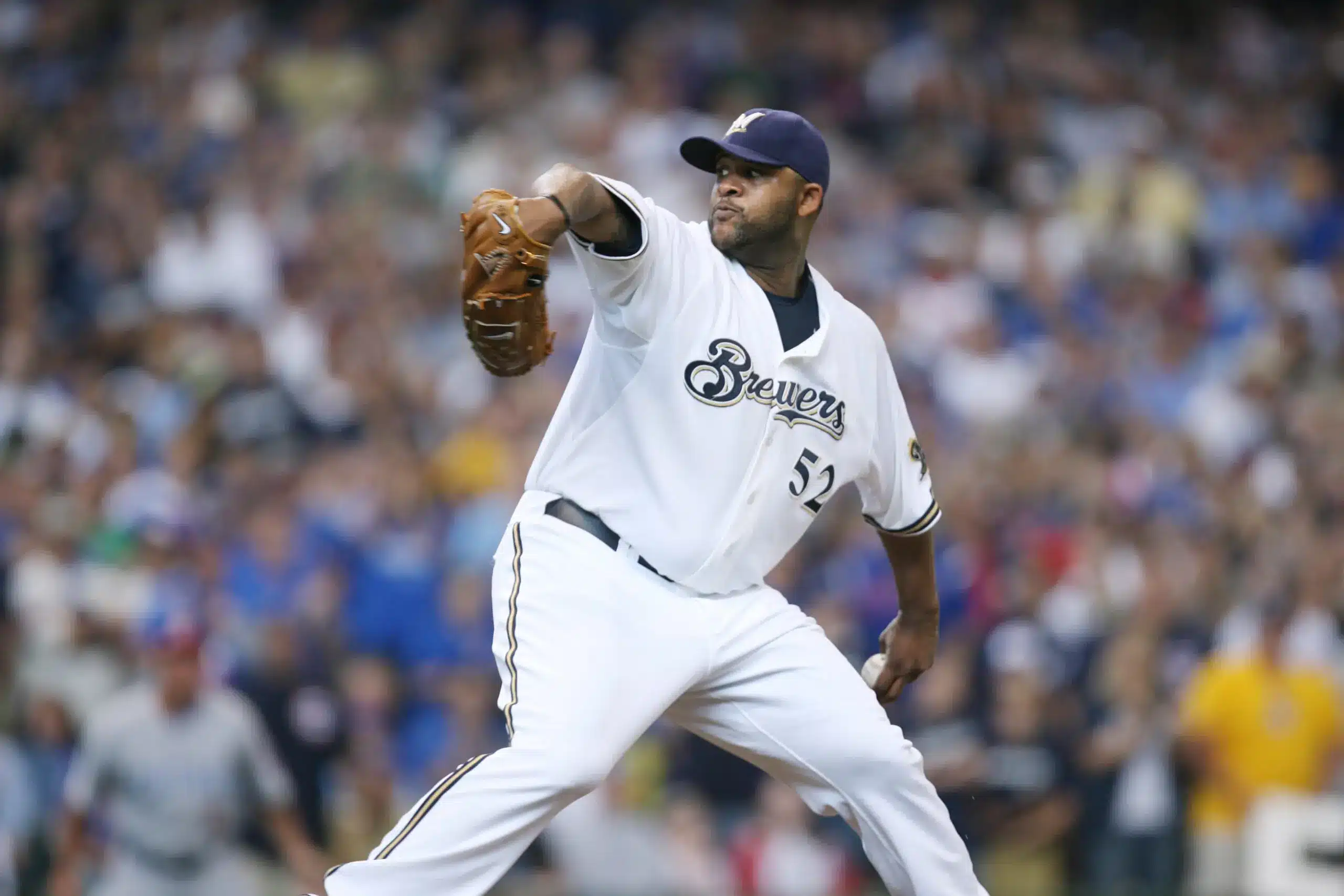 CC Sabathia pitching for the Milwaukee Brewers in a baseball game.