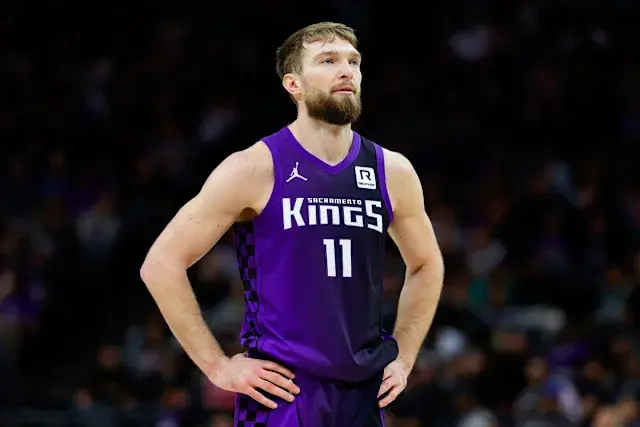 Domantas Sabonis in a Sacramento Kings jersey during a game.
