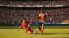 World Cup knockout stage soccer match action with players competing in packed stadium