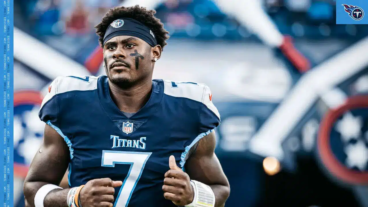 Malik Willis wearing a Tennessee Titans jersey, preparing for a game.