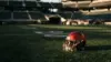 San Francisco 49ers helmet on stadium turf symbolizing roster decisions and team transitions