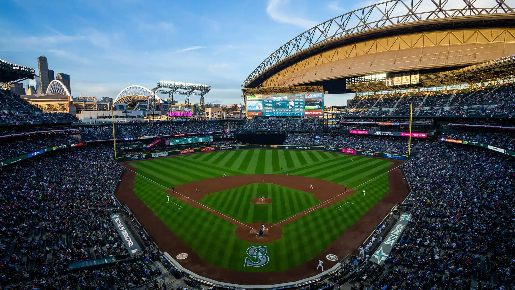 A panoramic view of T-Mobile Park during a Seattle Mariners game with a full crowd.