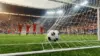Soccer ball in goal net during World Cup quarterfinal match with players celebrating in background