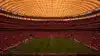 SoFi Stadium during World Cup 2026 knockout match with dramatic lighting and packed crowd