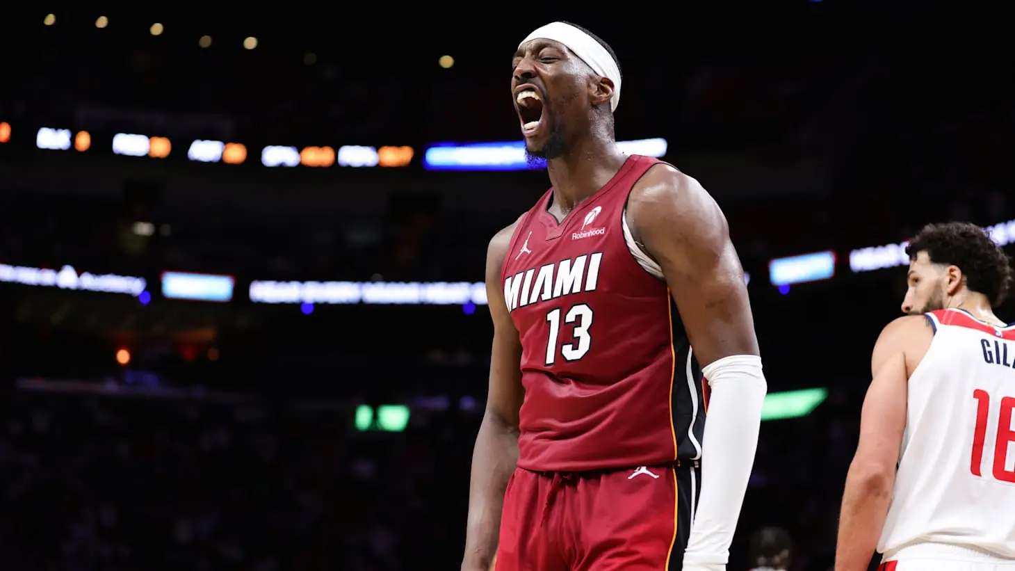 Bam Adebayo of the Miami Heat shouting in celebration during a basketball game