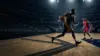 Faceless basketball player drives toward the basket in a dramatic NBA trade analysis scene