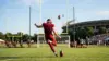 Anonymous NFL kicker sends a field goal through the uprights during a Washington Commanders training camp competition