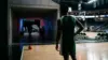 Silhouetted NBA player standing between opposing arenas after a controversial trade