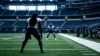 Anonymous Cowboys defensive players on a stadium field representing possible roster additions