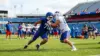 Anonymous Bills linebackers compete in a tense training camp roster battle on the practice field.
