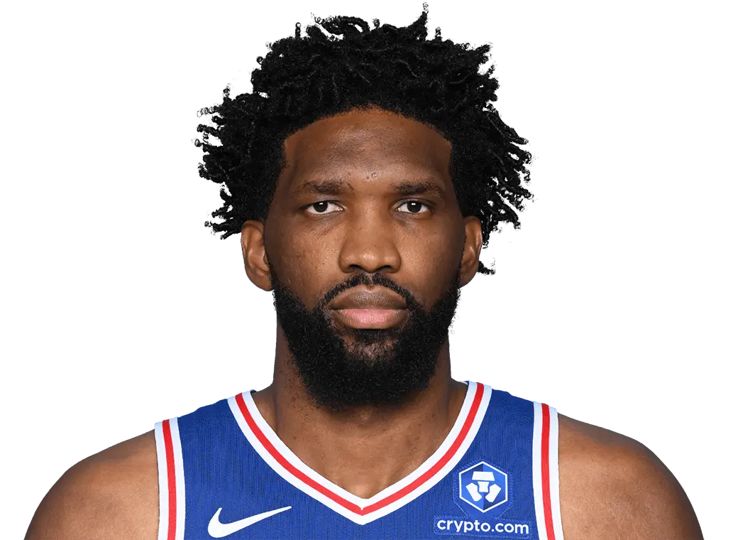 Headshot of Joel Embiid wearing a blue Philadelphia 76ers jersey against a white background