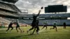 Raiders-inspired wide receivers work through a tense practice drill under coaching scrutiny