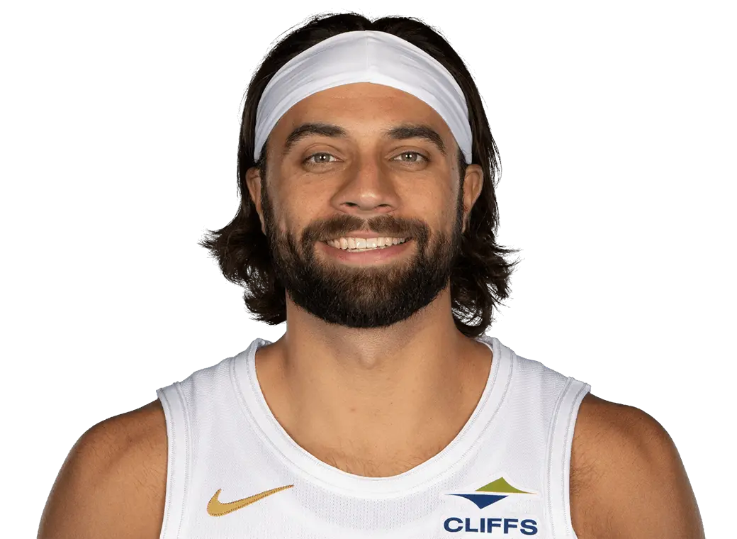 Headshot of Max Strus wearing a white Cleveland Cliffs jersey and a white headband.