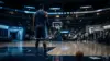 Silhouetted NBA power forward on a blue-lit court representing a potential Timberwolves trade target
