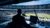NFL broadcast booth overlooking a stadium, symbolizing Brady’s Fox role and Raiders ownership limits